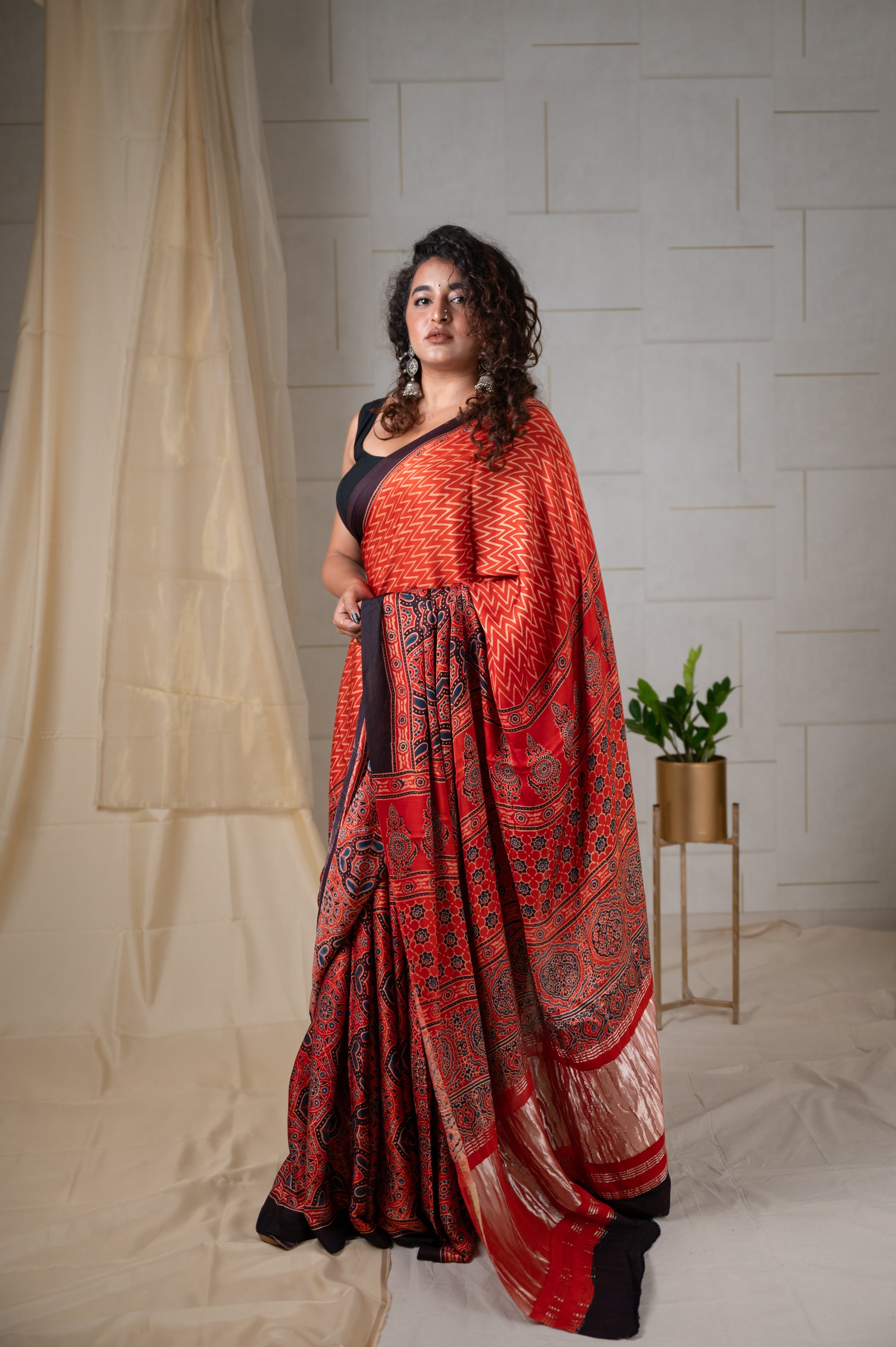 Modal Silk Ajrakh Saree with Zari Pallu - Brick Red